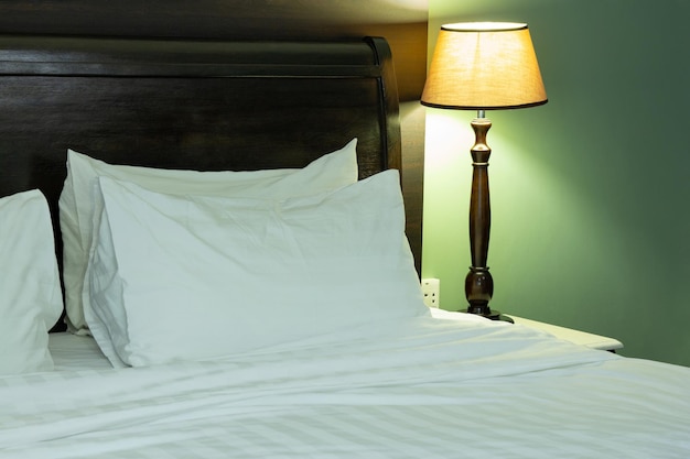 Bedroom Interior with Pillow and Table Lamp