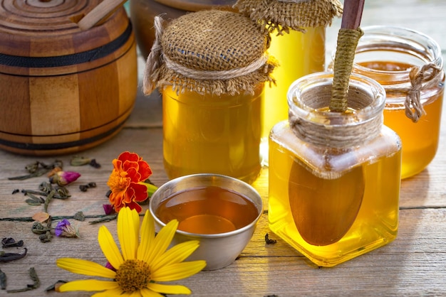 Bee honey in a composition with flowers