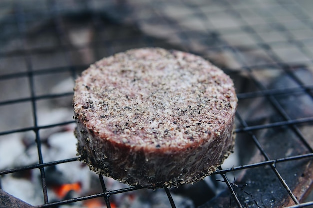 Beef grilled on a charcoal stove Barbecue hamburger