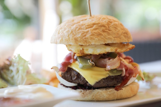 Beef Hamburger with Lettuce tomato egg and Cheese