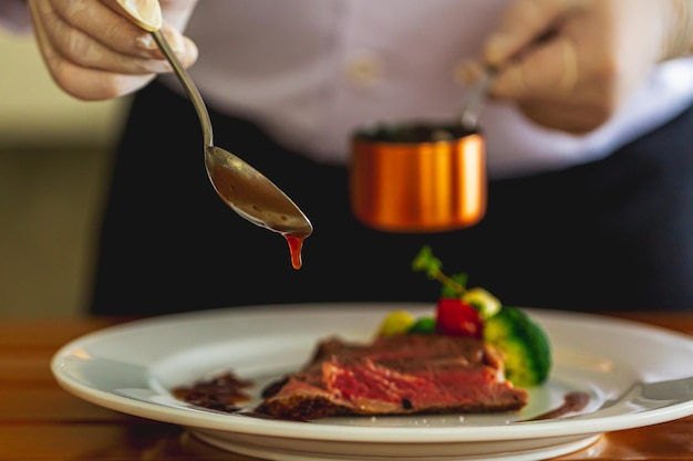 Beef steak and human hands,Be sure to have them ready in the restaurant.