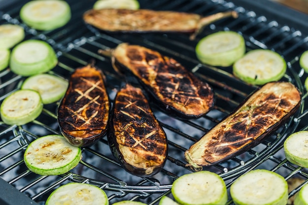 Beef steak with vegetables zucchini are cooked on the BBQ