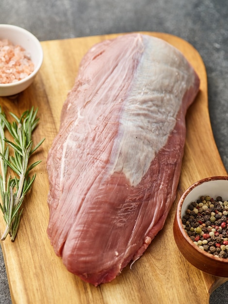 Beef tenderloin Fresh and raw meat Chuck tenderloin on the wooden tray