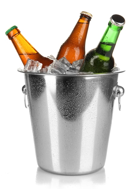 Beer bottles in ice bucket isolated on white