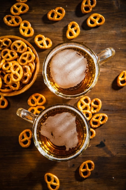 Beer in glasses with salted pretzels