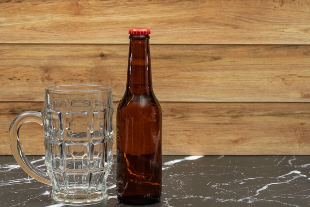 Beer gold bottle with glass for beer