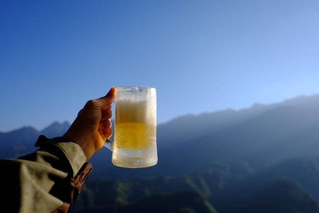 Beer and mountain background 