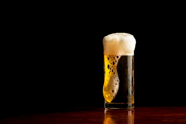 [Beer] mug of beer on dark background, Frosty glass of light beer set.