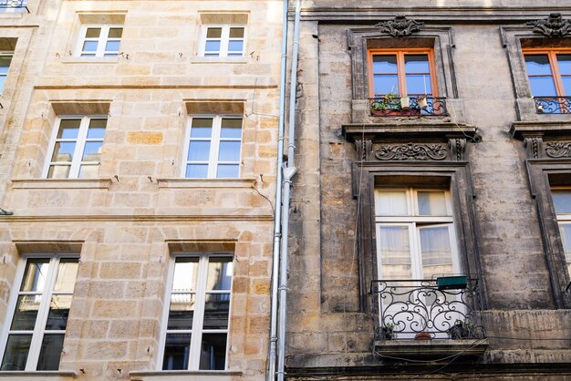 Before and After cleaning building stones facades with difference of wash clean house and dirty one