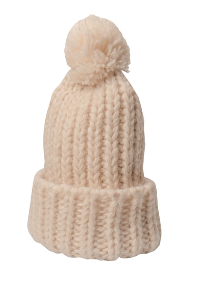 Beige beanie hat with pom pom isolated on a white background