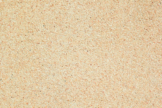 Photo a beige carpet with a red and orange pattern.