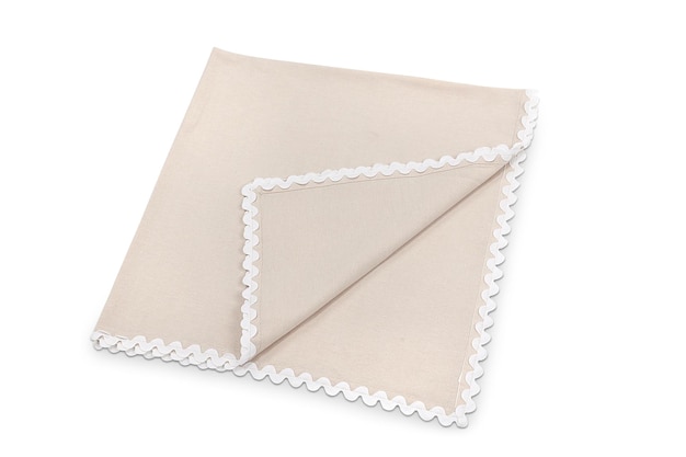 A beige fabric with a white trim that says'white'on it