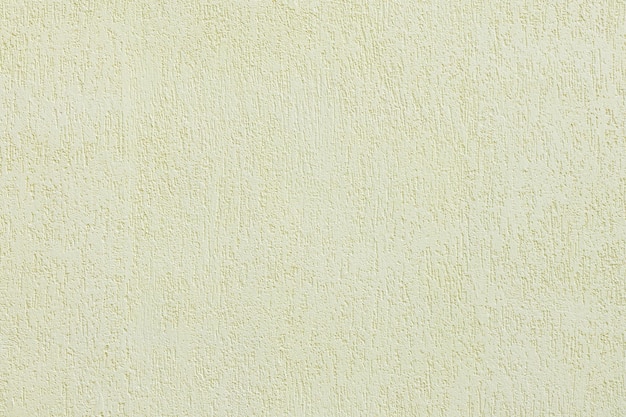 Beige plastered wall texture. Seamless surface and abstract solid background. Pale painted wall built structure