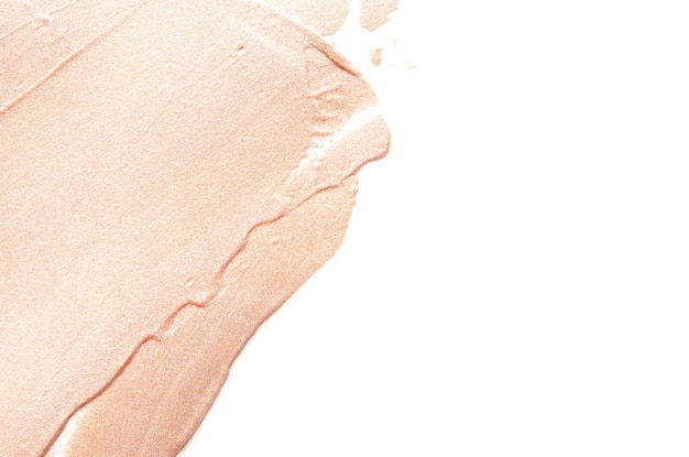 Beige smears of crushed highlighter or luminizer Image