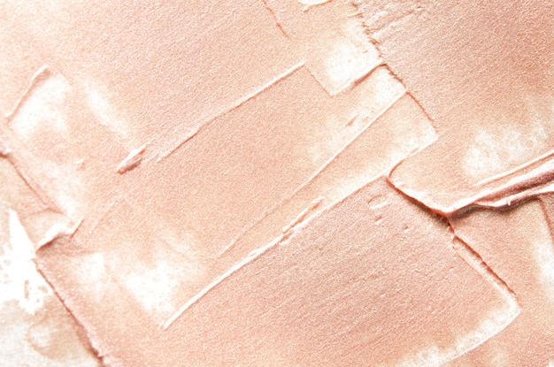 Beige smears of crushed highlighter or luminizer Image