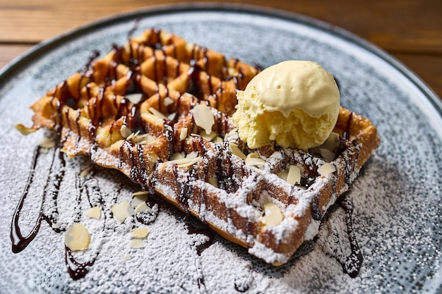 Belgian waffle with ice cream close