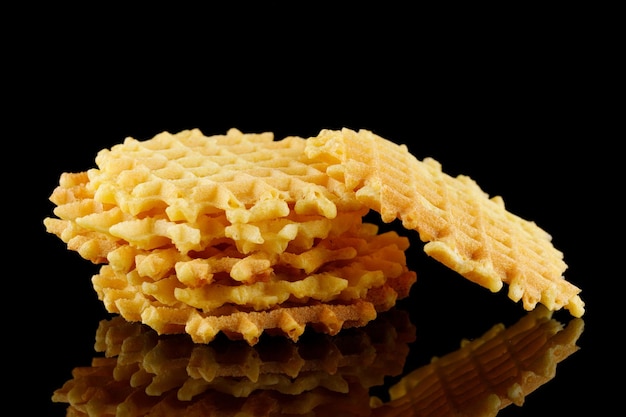 Belgian waffles on a black background Viennese wafers on an empty