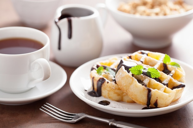 Belgian waffles with chocolate and powder sugar