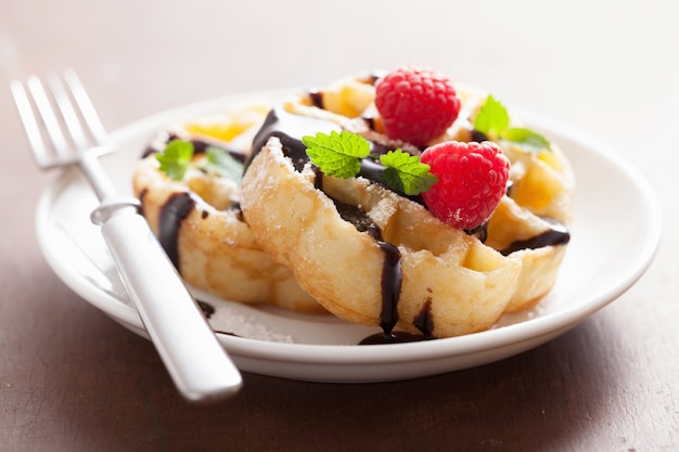 Belgian waffles with chocolate and raspberry