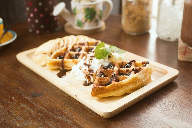 Belgian waffles with chocolate sauce.