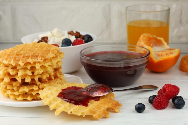 Belgian waffles with raspberry jam Belgian waffles with berries