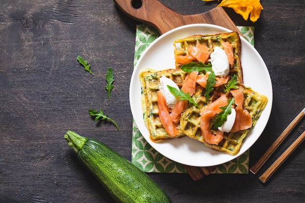 Belgian waffles with zucchini and greens with cottage cheese and salted salmon