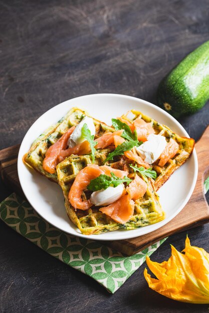 Belgian waffles with zucchini and greens with cottage cheese and salted salmon