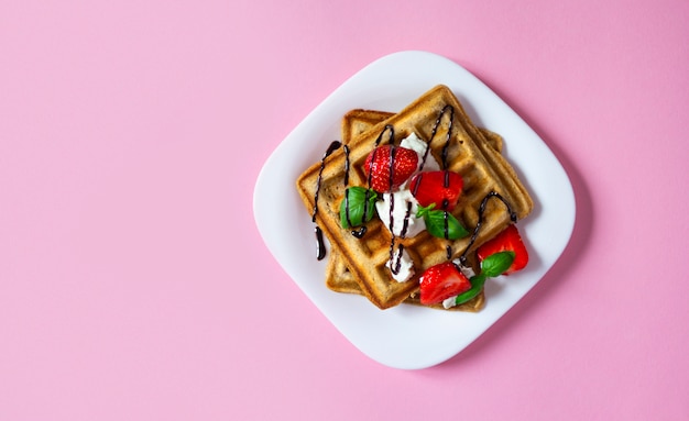 Belgium waffles dessert with strawberries and ricotta cheese