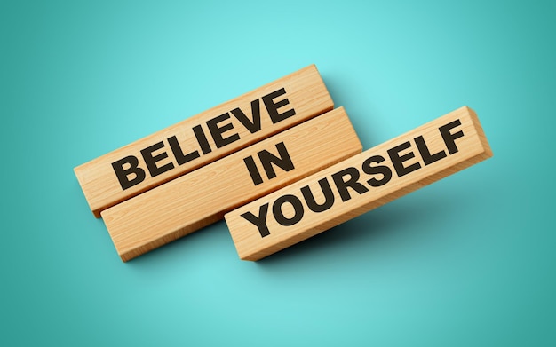 Believe In Yourself Text On Wooden Blocks Isolated on Soft Turquoise Background 3d illustration