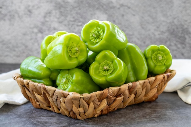 Bell Pepper on dark Background Fresh bell pepper in a basket Organic vegetable close up