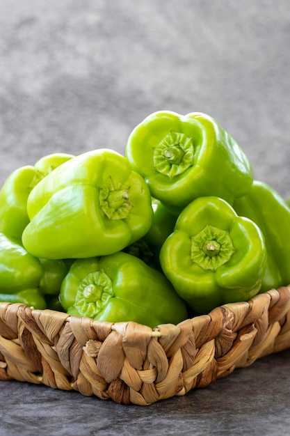 Bell Pepper on dark Background Fresh bell pepper in a basket Organic vegetable close up