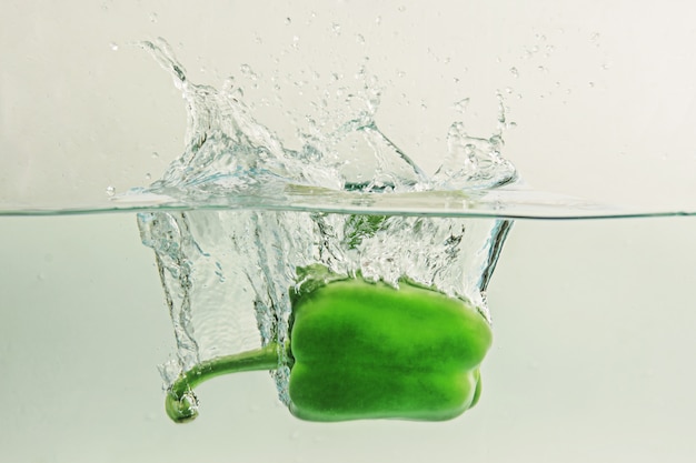 Bell pepper  falls in water