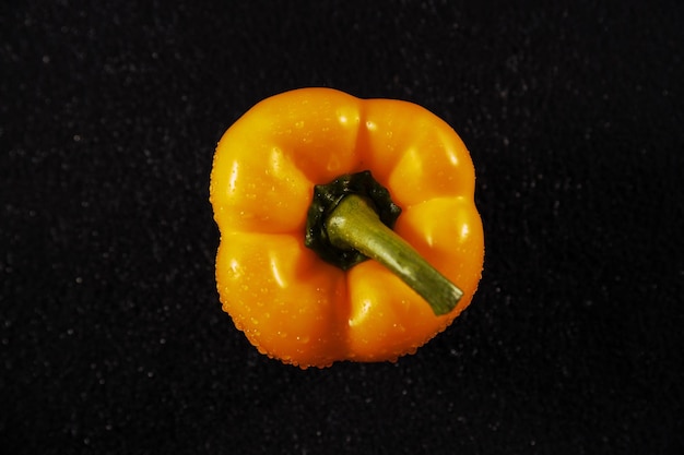 Bell peppers on black background paprika healthy eating vegetables vegetables for the restaurant