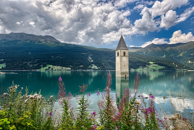 Bell tower of the Reschensee South Tyrol Italy