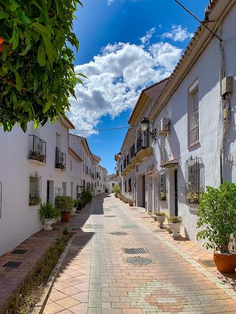 Benalmadena old town street spanish traditional balconies with flowers