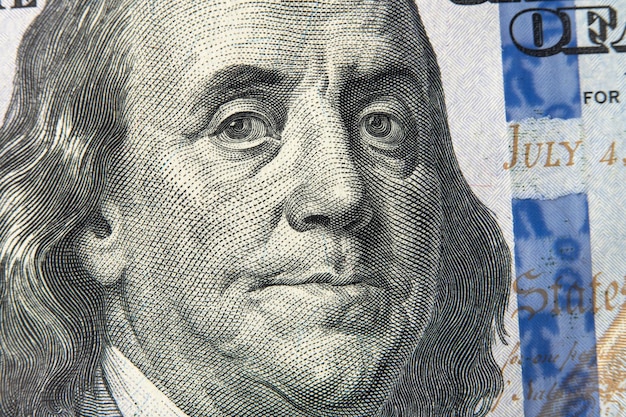 Benjamin Franklin's face on the US 100 dollar bill Franklin on one hundred dollar bill Detail of Portrait on One Hundred Dollar Bill