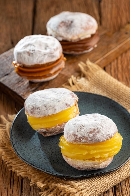 Berlin balls Bread filled with pastry cream and topped with sprinkled sugar