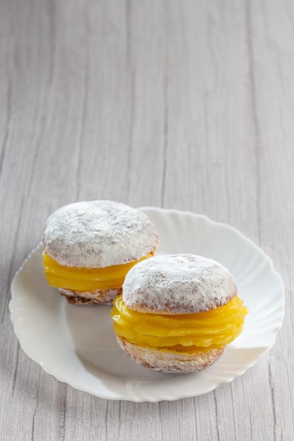 Berlin balls Bread filled with pastry cream and topped with sprinkled sugar