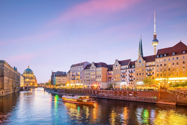 Berlin skyline with Berlin Cathedral (Berliner Dom) and Spree river at sunset twilight, in  Germany