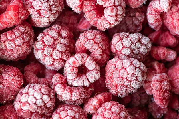 Berries of frozen raspberry background. Top flat lay view.