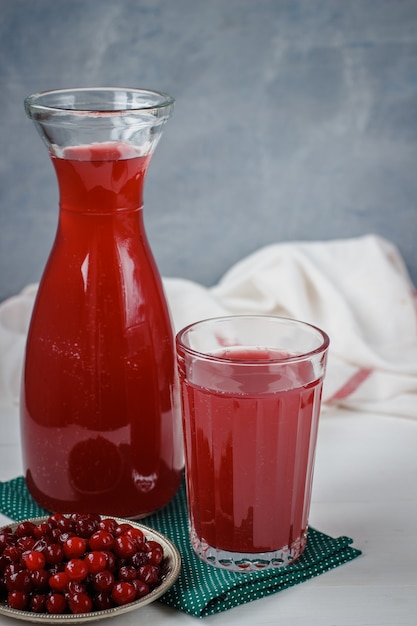 Berry drink from cowberry for health in glasswares