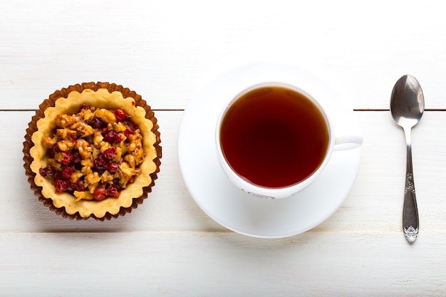 Berry tartlets and cup of tea