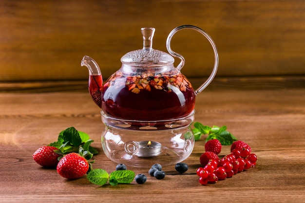 Berry tea in a glass teapot