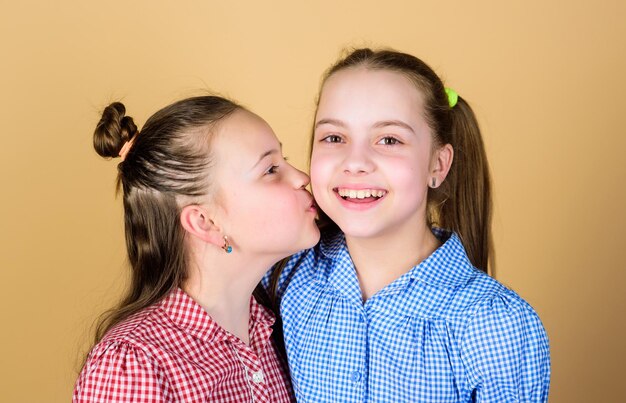 Best friends forever Happy childhood Girls sisters having fun together Adorable sisters smiling faces Family love Sisterhood concept Happy children play together Having sister is always fun