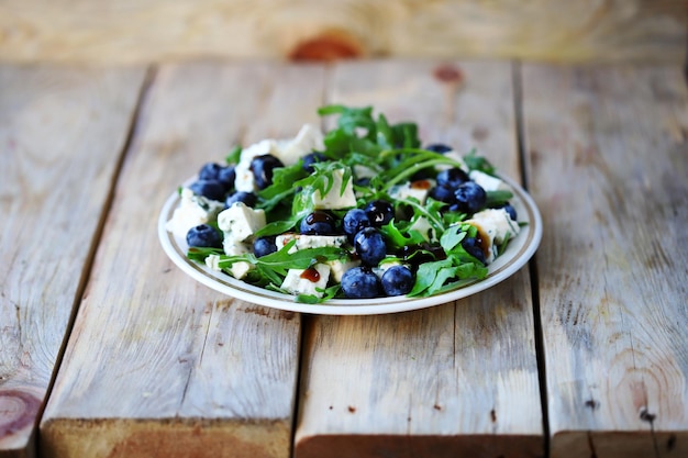 The best salad with blueberries cheese and arugula