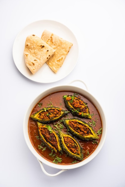 Bharwa Karela masala or stuffed bitter melon curry recipe