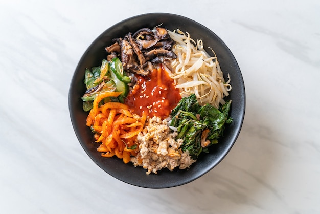 Bibimbap, Korean spicy salad with rice bowl - traditionally Korean food style