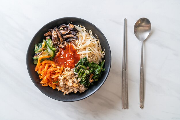 Bibimbap, Korean spicy salad with rice bowl