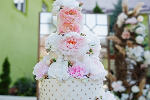 Big amazing wedding cake with flowers