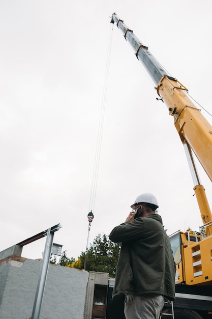 Big building crane on construction site